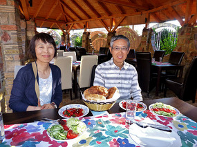 Junko and Hiro Enjoy a Meal in Bogojevo, Serbia