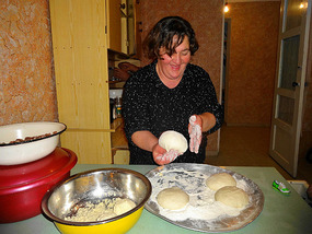 Mari making meaty Kubdari (meat pie)