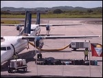 Watching our luggage on the tarmac