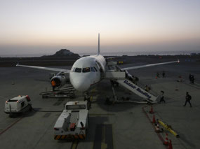Dawn Plane Boarding in Santorini