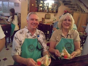 David and Marion showing off salad rolls