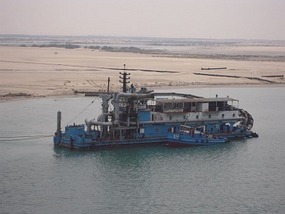 Dredging the canal
