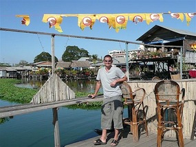 Ads propping up the floating hostel bar! 