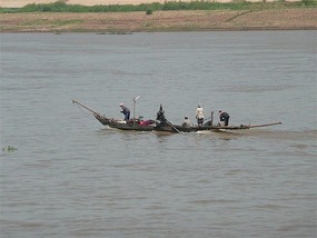 Locals fishing in the city river