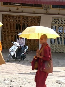 Monks & umbrellas..