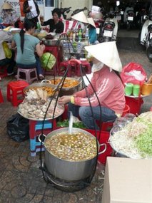 Lady selling food in the market