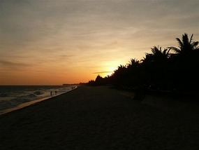 Sun setting over the beach