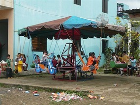 Local kids on a merry go round, random!