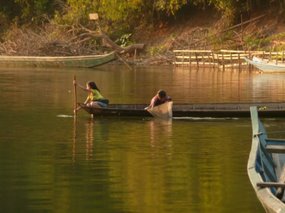 Chidren fishing on the river