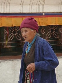 Locals looking after the stupa..