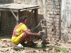 Using the water pump amongst the filth