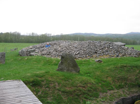 Cairn and part of a standing stone