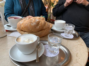 Coffee and basket of bread