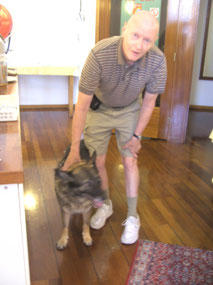 Mike petting the hotel dog