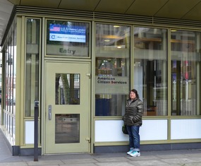 Melissa at entry to American Embassy