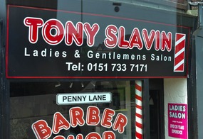 The Barbershop where the barber shows photos