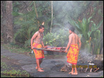 Fellas Bringing in Supper for the Luau