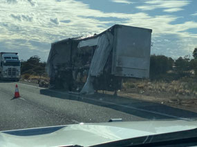 The side of this trailer has been swiped out!