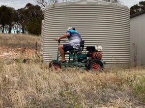 Now he has the mower going