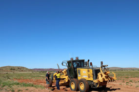 Pete asking the grader driver what he knew!