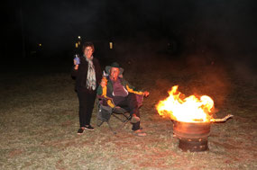 Enjoying the fire drum at the back of the vans