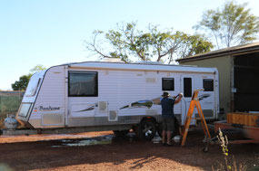 Giving the caravan a wash