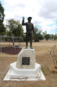 Ken Russell statue in Monto