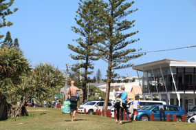 Young family surfing at Lennox Heads