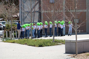School children performing near Info Ctre