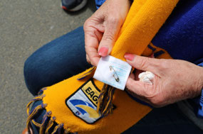 Coral's lucky pin