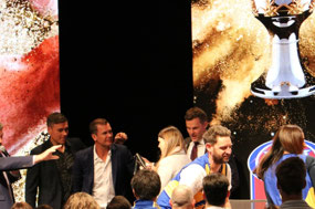 The trio were swamped for photos