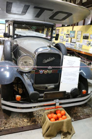 Studebaker with the box of oranges