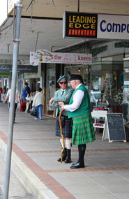 Two local in Scottish attire