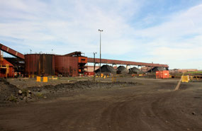 Heaps of iron ore pellets at Whyalla Steel Mill