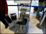 Scales show12 kgs at checkin