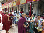 Feeding monks - Amarapura