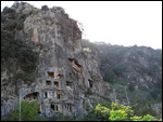 Ancient tombs in the cliffs above the town
