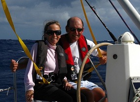 Donna and Dave at helm after crossing Gulf Stream