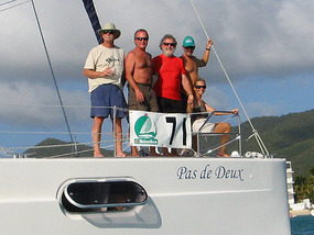 The crew poses for a post-race picture aboard