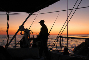 Dave on a sunset helm