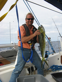Bob hauls in a mahi underway