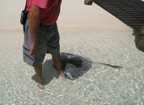 Ray cozies up to Dave at Manjack Cay