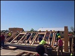 Women's build wall raising