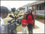 New homeowner Tiffany Walker and son Brandon