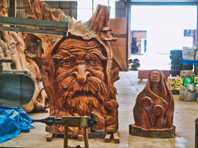 Carvings using Ancient Kauri Logs