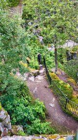 Lo walking down path