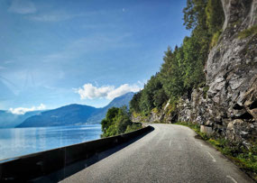 Narrow, one-lane road along Hardangerfjord