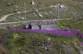 old stone buildings - Bernina Express Train