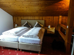 Bedroom in Chalet at Hotel Silberhorn