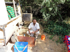Michael fixing breakfast in the bush